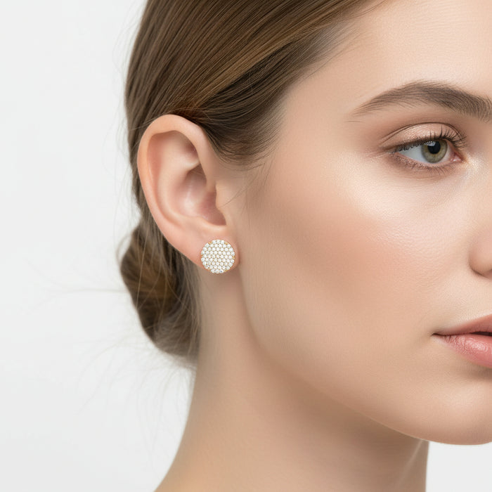  Silver Gold Plated round earrings with diamond-like stones on a white surface