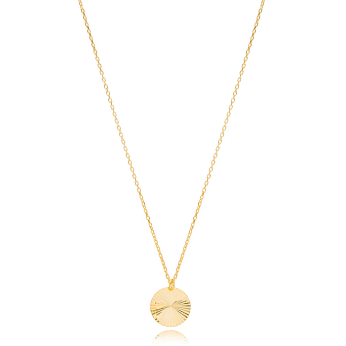 Gold necklace with a round pendant 