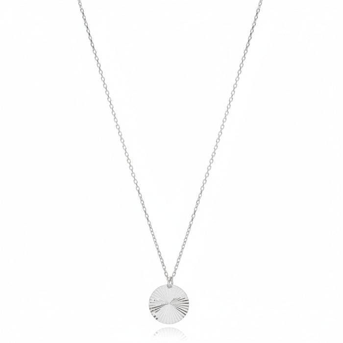Silver necklace with a round pendant 